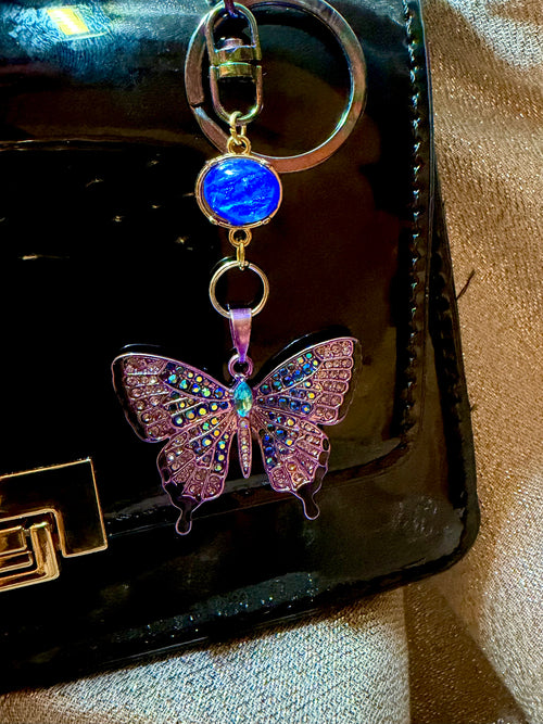 Blue and Purple Rhinestone Butterfly Keychain with iridescent blue accent bead and oil spill Clasp