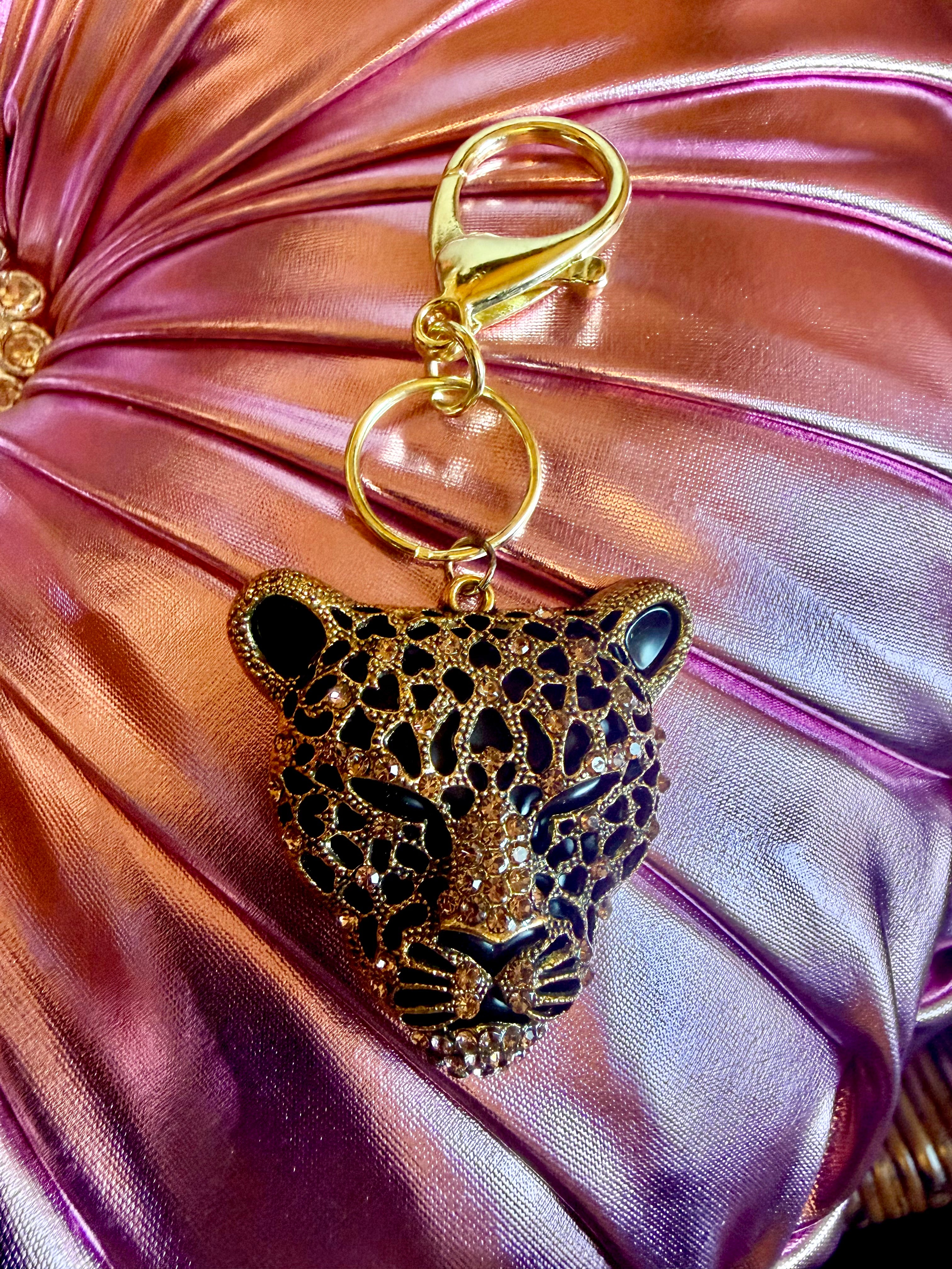 Gold tone Classy Cheetah Keychain with Rhinestone accents!