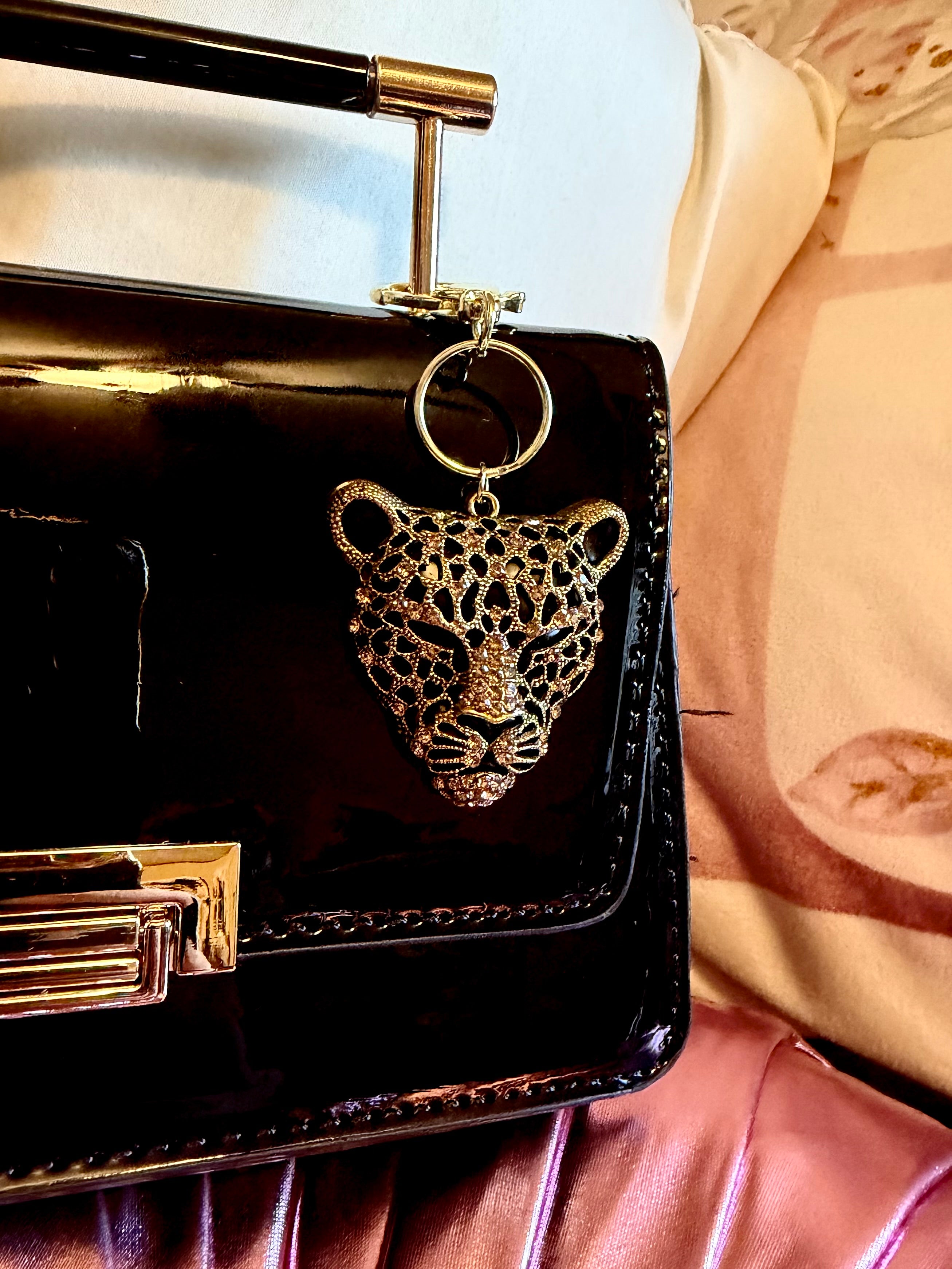 Gold tone Classy Cheetah Keychain with Rhinestone accents!