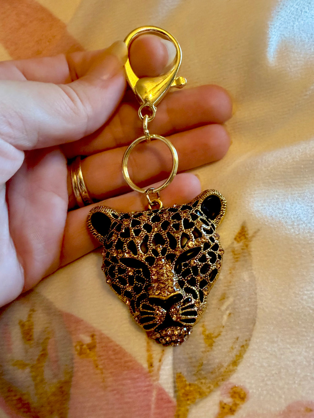 Gold tone Classy Cheetah Keychain with Rhinestone accents!